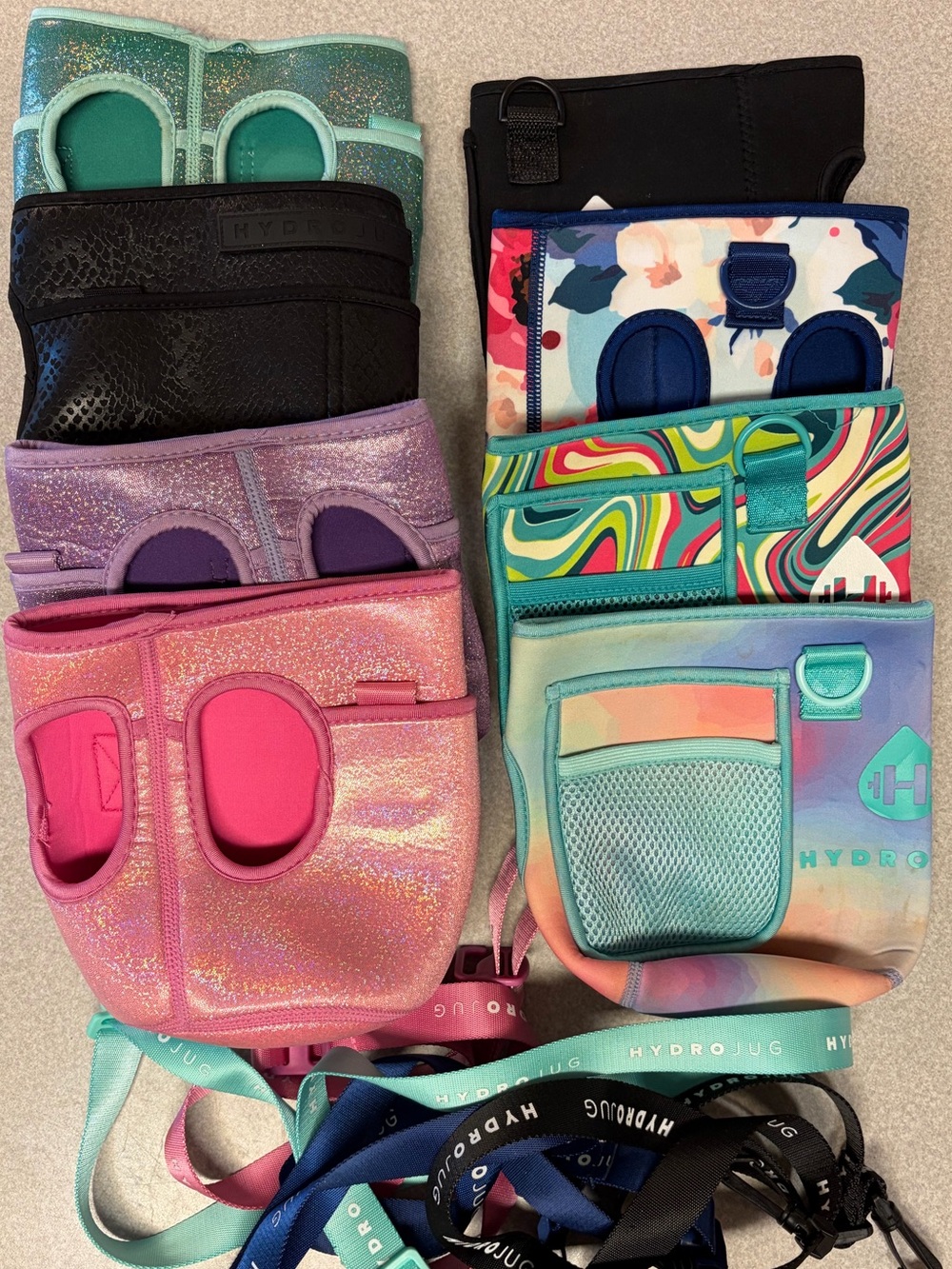 8 HydroJug Assorted Glitter, Pastel, Black & Swirl Bottle Sleeves.